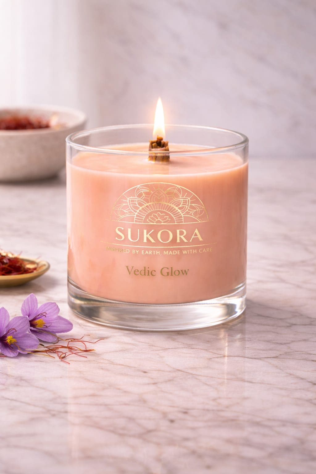 Vedic Glow — kumkumadi-inspired soy candle in a clear glass jar